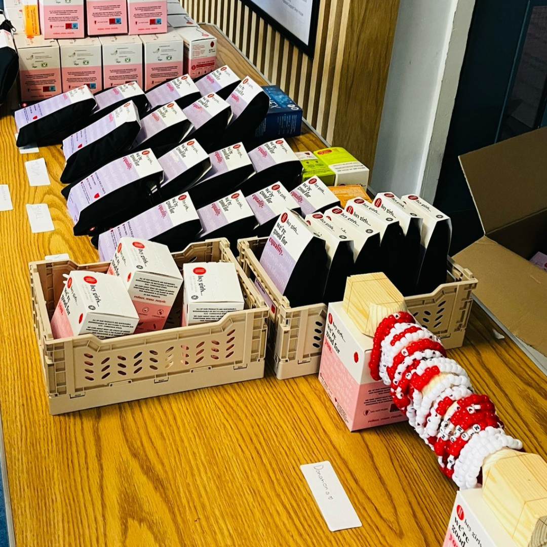 Menstrual Health day stall, with period products.