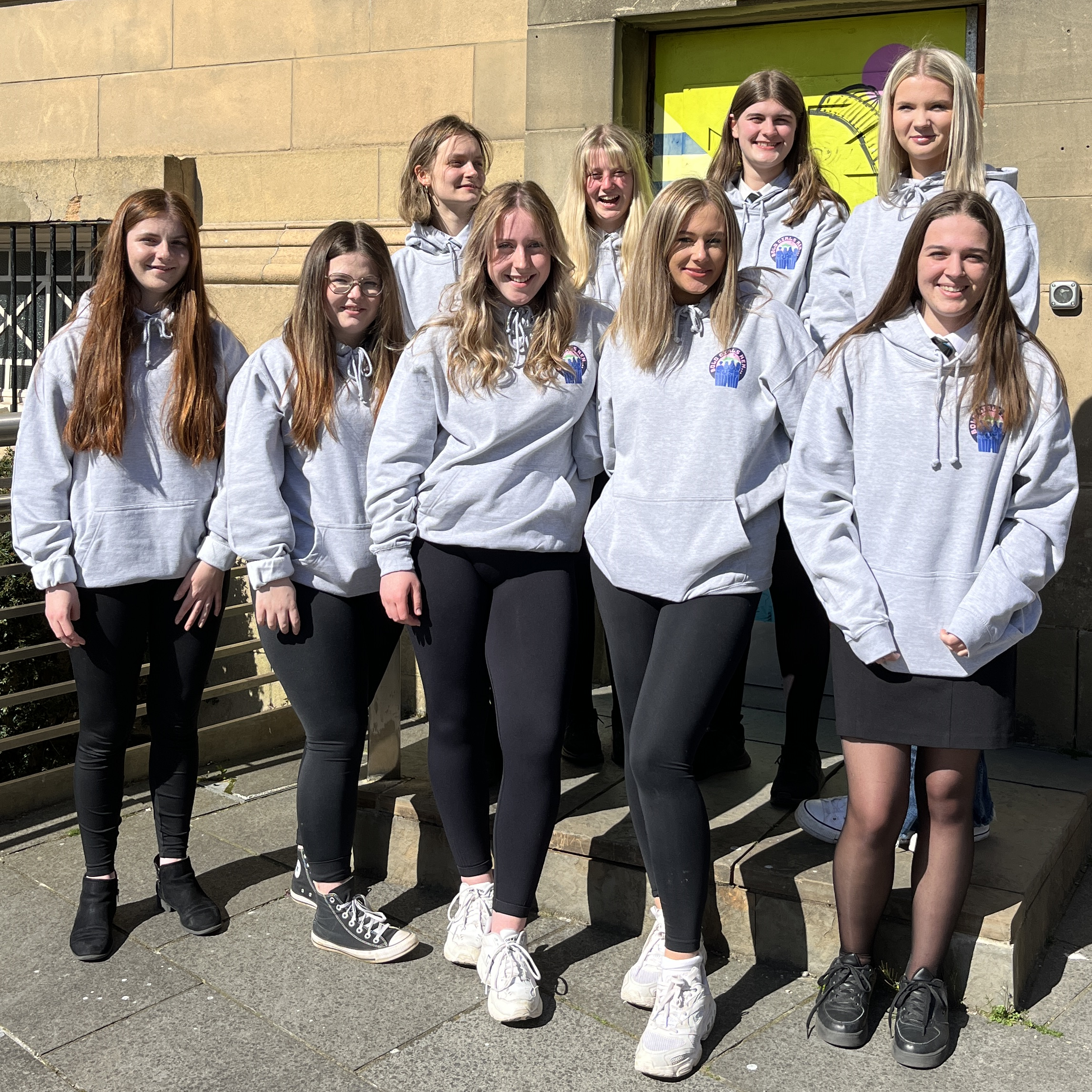 Bold Girls Ken group in matching grey hoodies