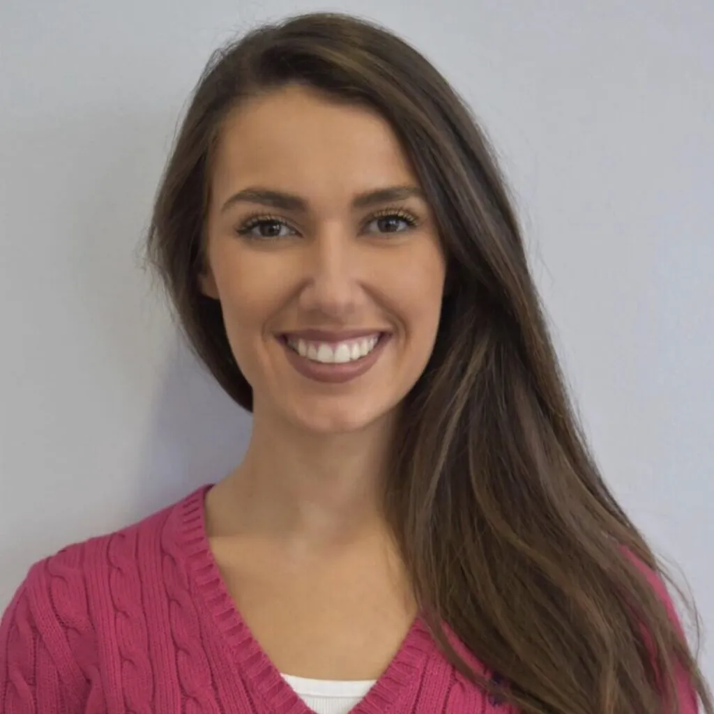 Annabel Farnood smiling at the camera against a plain background