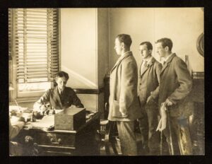 photograph of Murray at her desk in Endel Street discharging patients