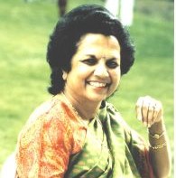 A picture of Saroj and smiling at the camera